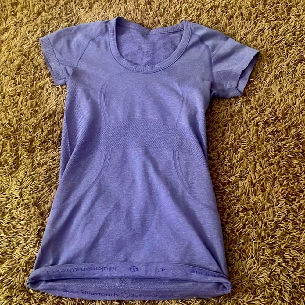 Purple lululemon swiftly tech size 4
